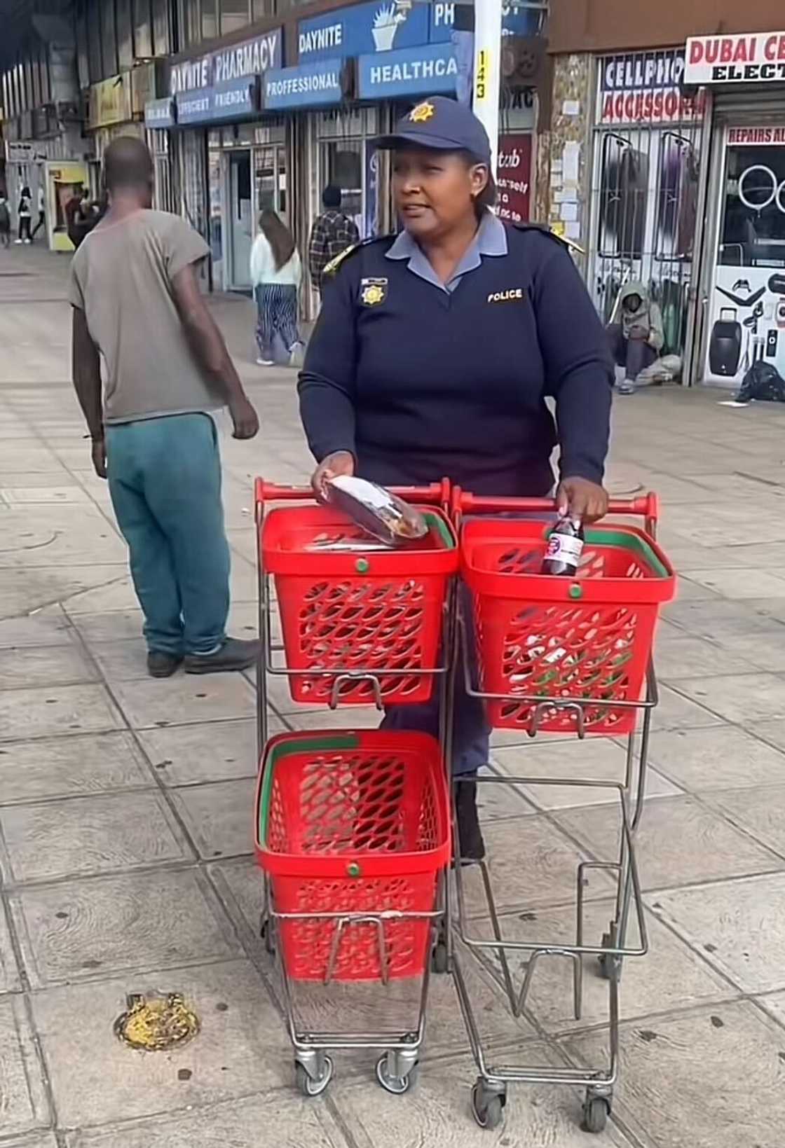 A South African police officer’s act of kindness sparked divided reactions. A South African police officer’s act of kindness sparked divided reactions.