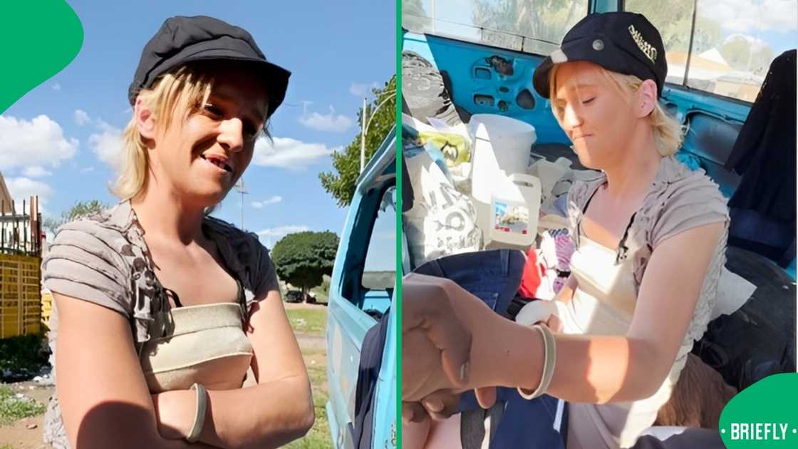 BI Phakathi helped a woman selling clothes. BI Phakathi helped a woman selling clothes.