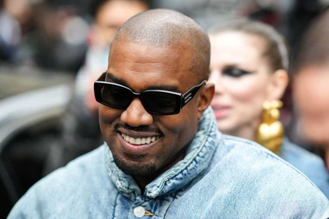 Ye is seen, outside Kenzo, during Paris Fashion Week