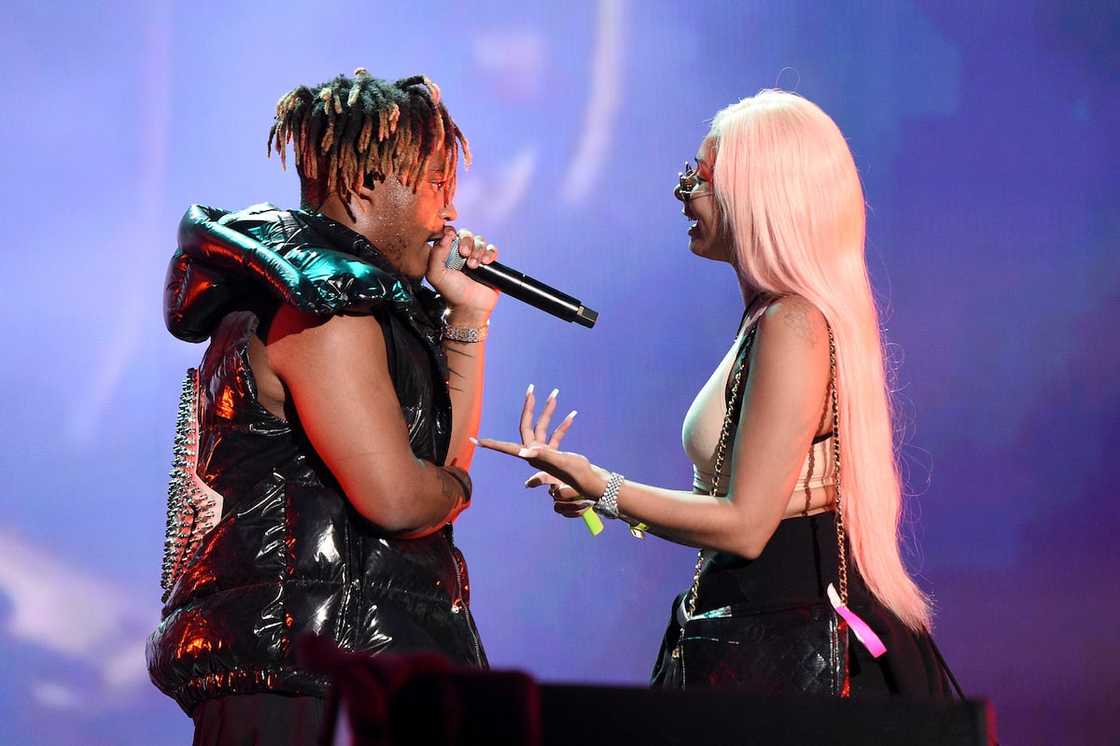 Juice Wrld and Ally Lotti onstage Juice Wrld and Ally Lotti onstage