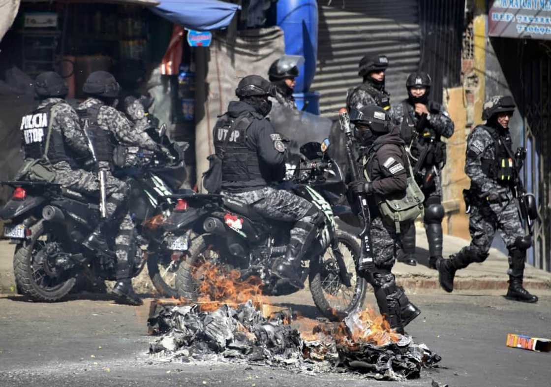 Riot police clash with coca leaf growers during a protest march in La Paz, on August 2, 2022 Riot police clash with coca leaf growers during a protest march in La Paz, on August 2, 2022