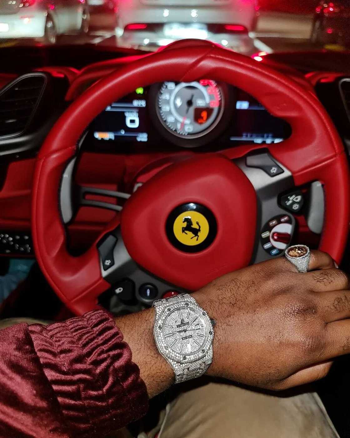 Does Cassper own a Ferrari?