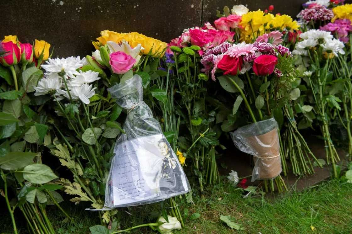 Floral tributes were also left at the queen's Windsor Castle home west of London and outside Holyroodhouse in Edinburgh