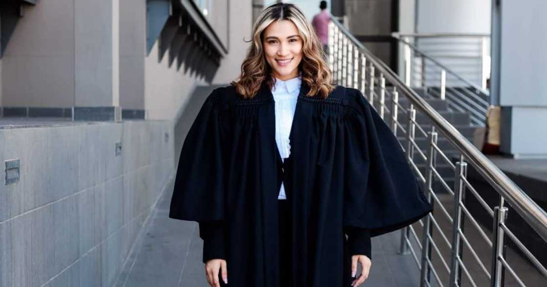 A newly admitted high court attorney looking victorious after her admission