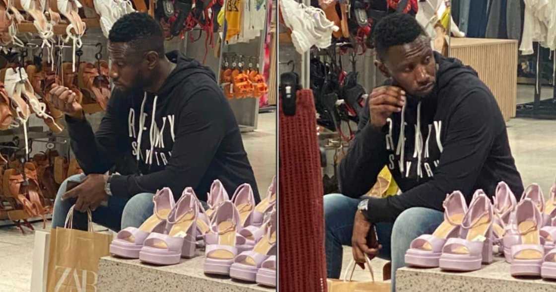 Man wait for girlfriend who is shopping