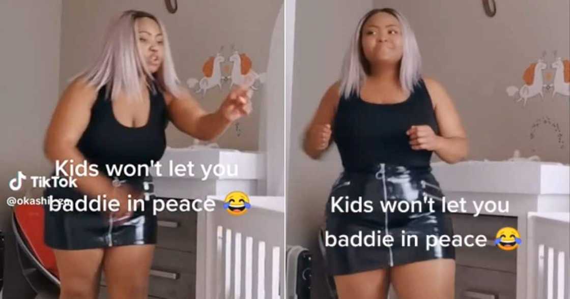 Woman tries to do TikTok but is interrupted by kid Woman tries to do TikTok but is interrupted by kid