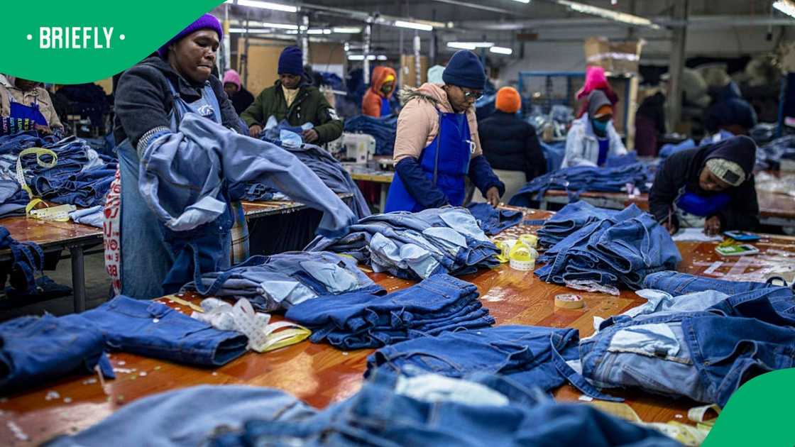 JULY 4: Factory workers employed by Afri-Expo check denim products before shipping on July 4, 2025 in Maseru, Lesotho. The company exports most of its products to South Africa but also some to the US
