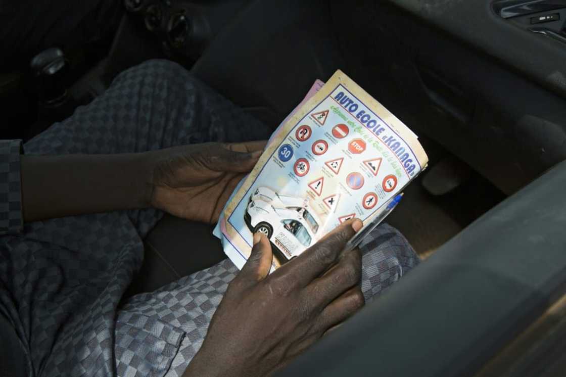 Le code de la route: Road signs in Mali are in French, part of the country's colonial legacy Le code de la route: Road signs in Mali are in French, part of the country's colonial legacy