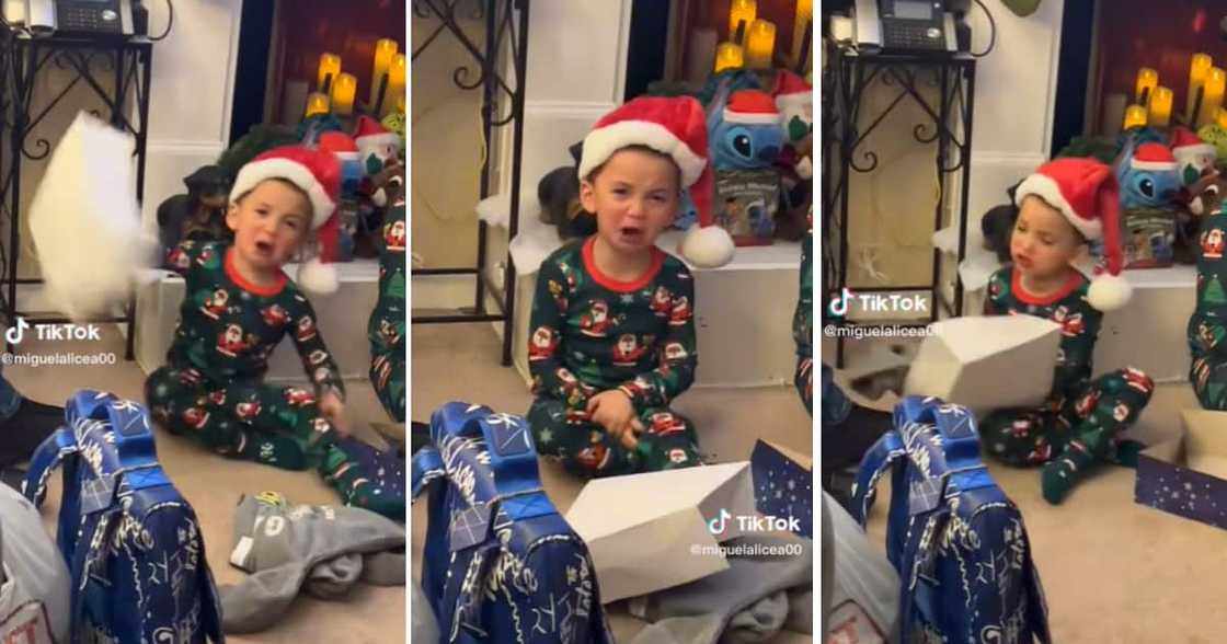 Little boy throwing a tantrum over Christmas clothes Little boy throwing a tantrum over Christmas clothes
