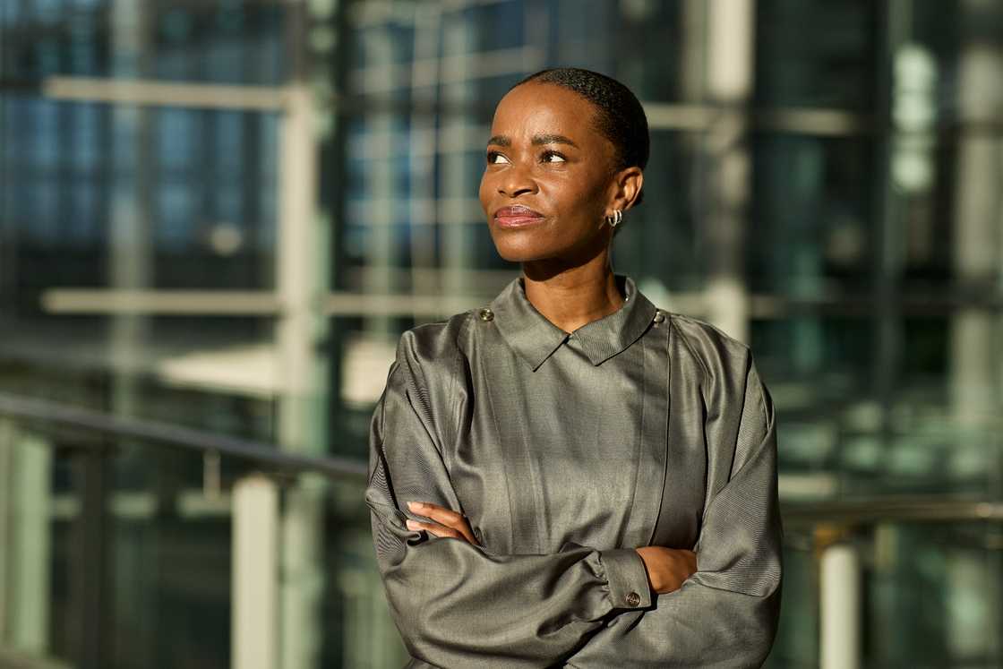 Thoughtful businesswoman looking away Thoughtful businesswoman looking away