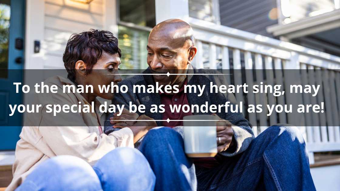 A couple having coffee on front porch