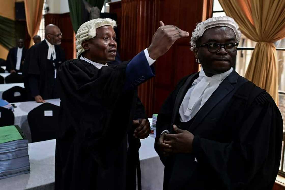 Ruto's team has urged the court to throw out the petition, accusing Odinga of trying to force a re-run Ruto's team has urged the court to throw out the petition, accusing Odinga of trying to force a re-run