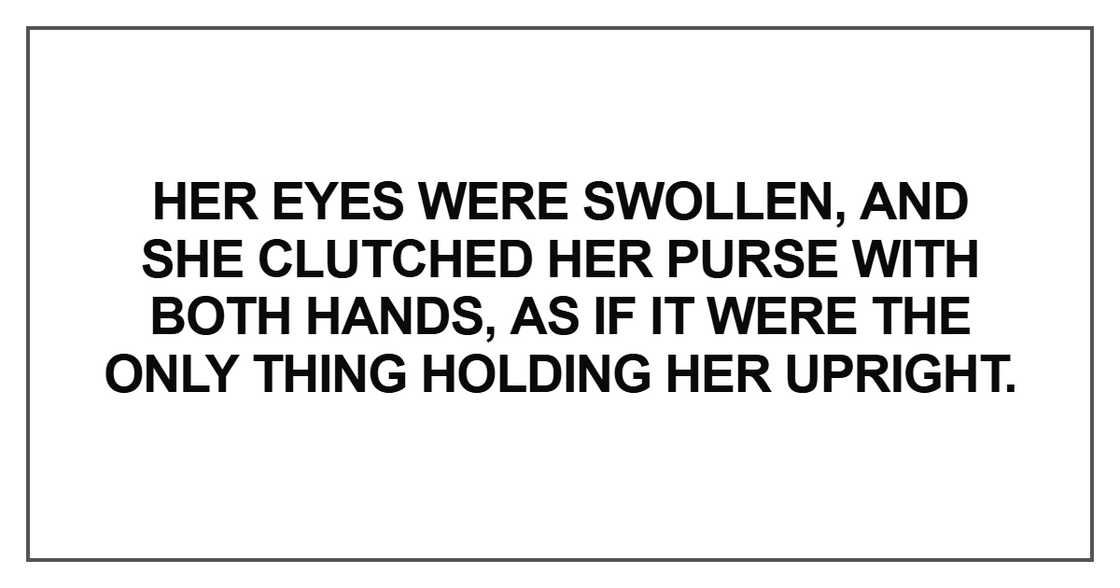 Her eyes were swollen, and she clutched her purse