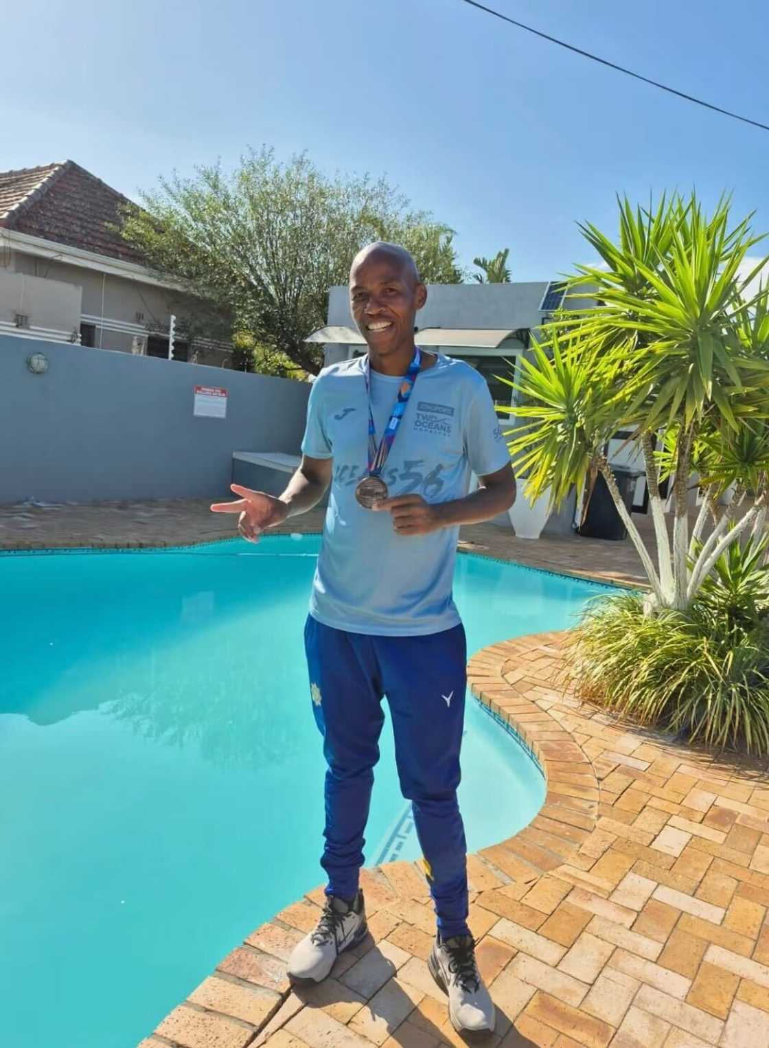 The 2025 Comrades Marathon runner was heartwarmingly welcomed back to work. The 2025 Comrades Marathon runner was heartwarmingly welcomed back to work.