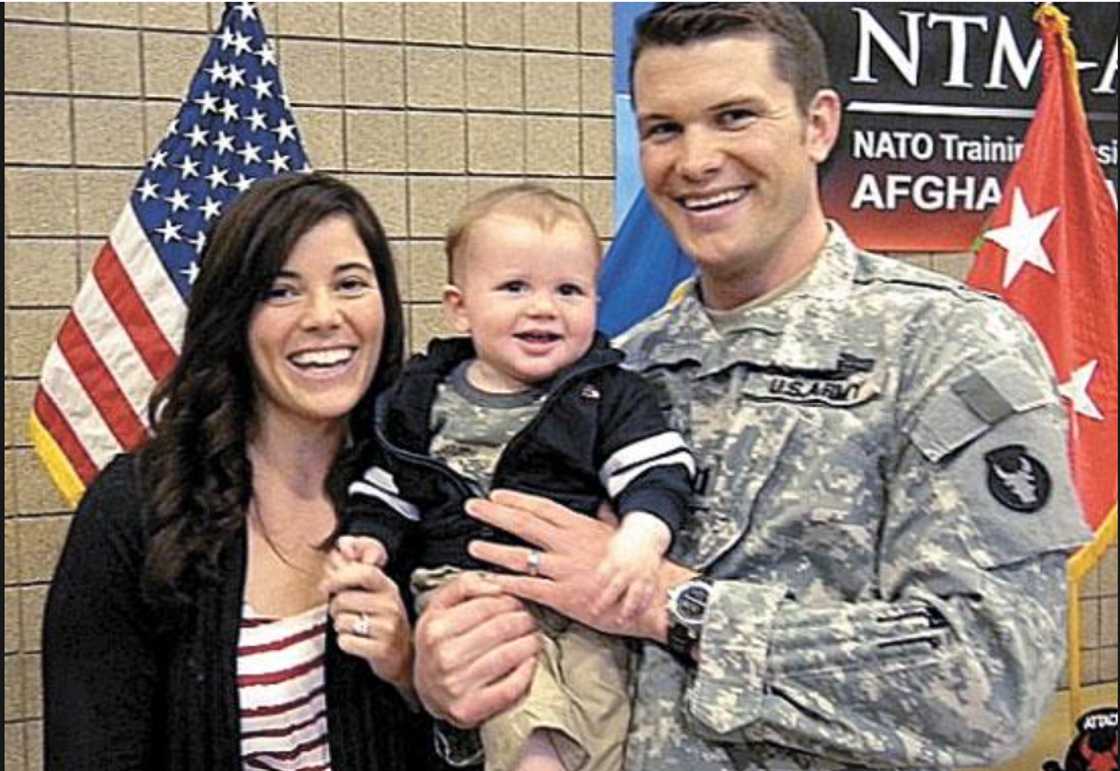 Samantha Hegseth and Pete Hegseth holding their baby