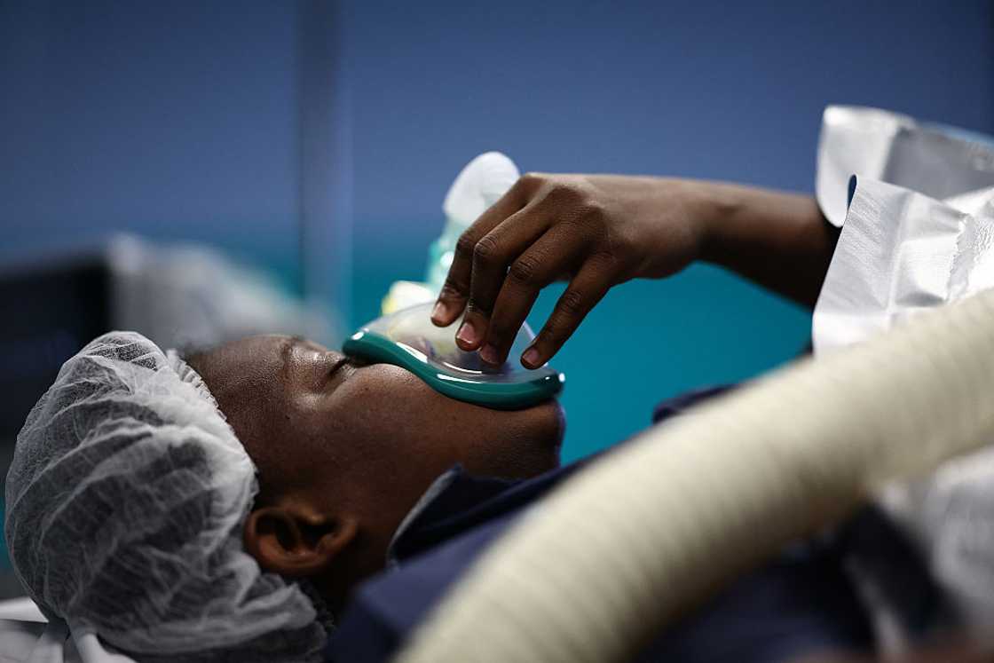 Woman in hospital bed