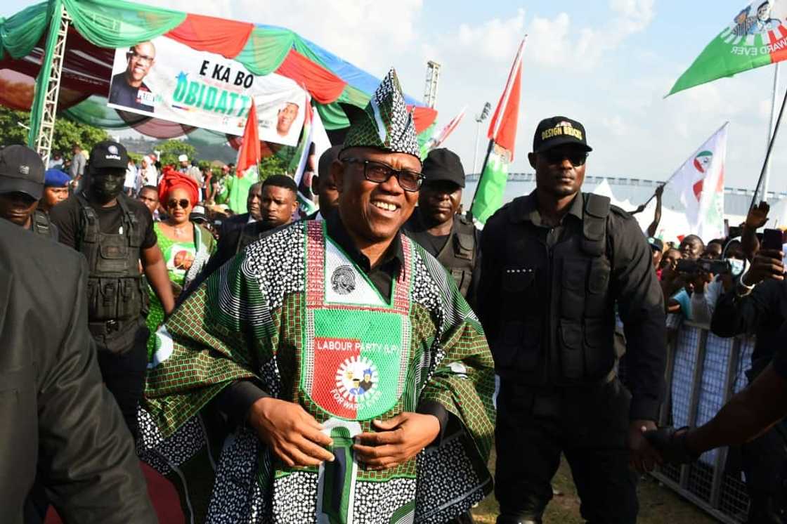Labour Party's Presidential candidate Peter Obi (C) is appealing to many young Nigerians with his outsider message Labour Party's Presidential candidate Peter Obi (C) is appealing to many young Nigerians with his outsider message