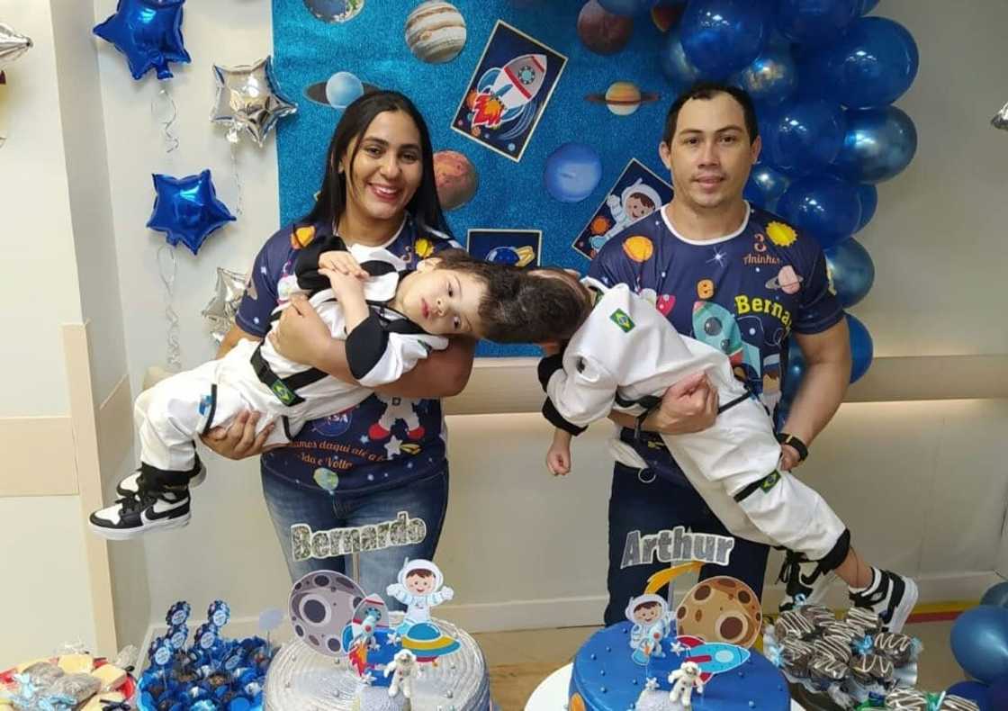 Brazilian conjoined twins Bernardo (L) and Arthur with their parents Adriely (L, back) and Antonio Lima, in Brazil: the twins were born with a single, shared brain have been separated in a complex surgery that doctors prepared for with the help of virtual reality. Brazilian conjoined twins Bernardo (L) and Arthur with their parents Adriely (L, back) and Antonio Lima, in Brazil: the twins were born with a single, shared brain have been separated in a complex surgery that doctors prepared for with the help of virtual reality.