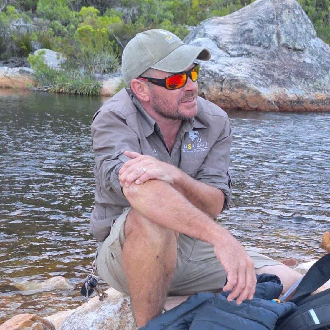 Others advised the snake rescuer to go home, saying he had seen enough for one day Others advised the snake rescuer to go home, saying he had seen enough for one day