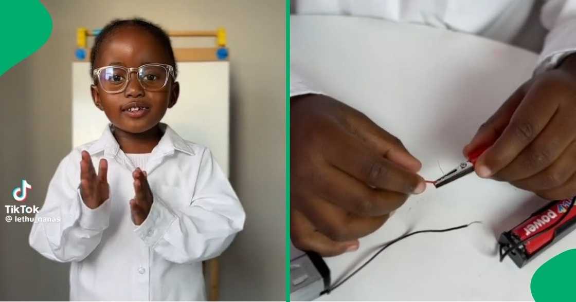 A young girl builds an electric circuit project A young girl builds an electric circuit project