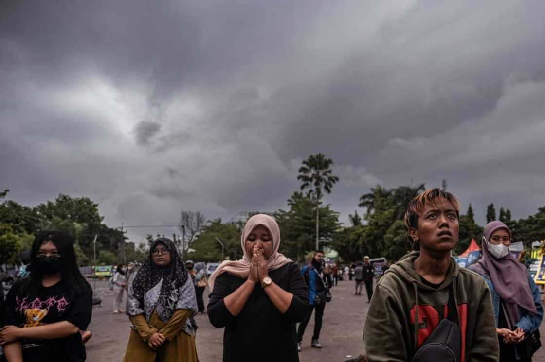 People pay their respects to the victims at Kanjuruhan stadium in Malang People pay their respects to the victims at Kanjuruhan stadium in Malang