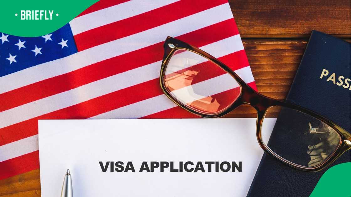 A stock photo of US flag and a passport A stock photo of US flag and a passport