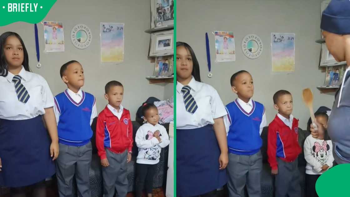 A woman lined up her four children. A woman lined up her four children.