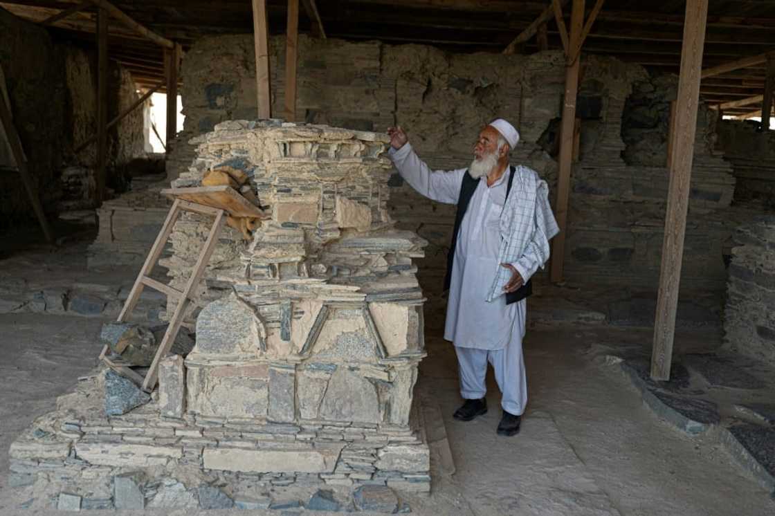 The ruins, which cover 1,000 hectares, are perched high on a massive peak whose brown flanks betray the presence of copper The ruins, which cover 1,000 hectares, are perched high on a massive peak whose brown flanks betray the presence of copper