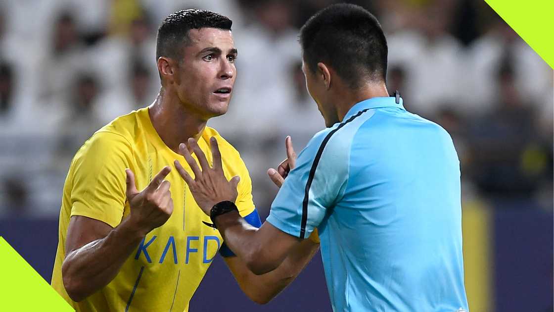 Cristiano Ronaldo argues with a referee during Al-Nassr's AFC Champions League play-off against Shabab Al-Ahli. Photo by Yazid al-Duwihi.