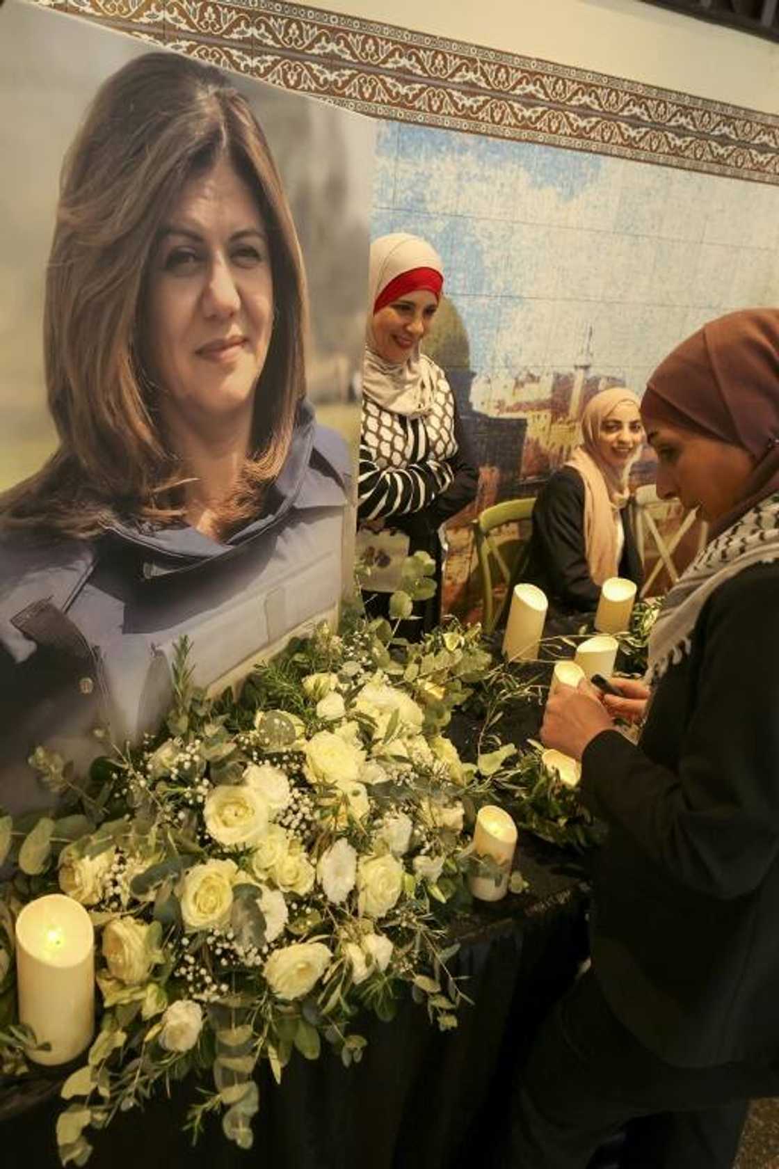 Mourners at a memorial ceremony for Al Jazeera journalist Shireen Abu Akleh, at a service in the West Bank city of Ramallah on June 19, 2022 Mourners at a memorial ceremony for Al Jazeera journalist Shireen Abu Akleh, at a service in the West Bank city of Ramallah on June 19, 2022
