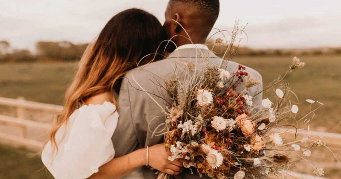 mixed race, couple, marry, wedding, rural, singing, dancing, flowers, makoti