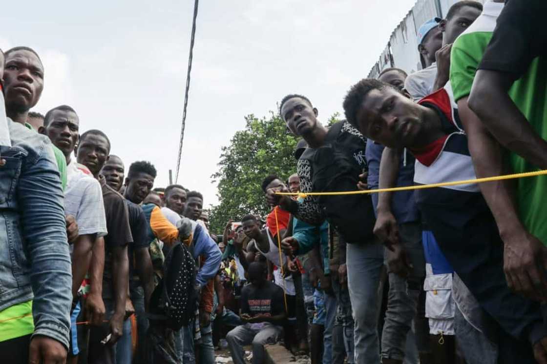 Liberians around the country have for weeks been queuing outside wholesalers to try to buy rice Liberians around the country have for weeks been queuing outside wholesalers to try to buy rice