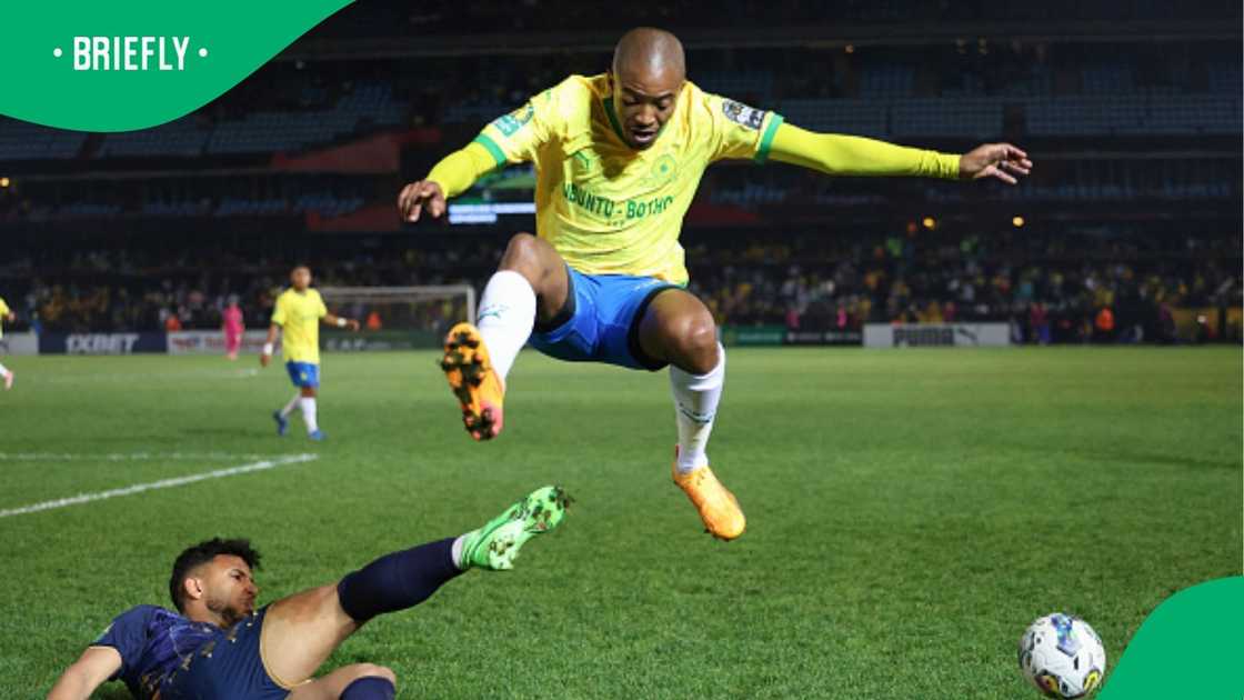 Thapelo Morena enjoys a fun and heartwarming moment with his wife and children. Thapelo Morena enjoys a fun and heartwarming moment with his wife and children.