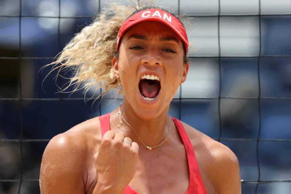 Brandie Wilkerson celebrates during the Women's Preliminary - Pool C beach volleyball Brandie Wilkerson celebrates during the Women's Preliminary - Pool C beach volleyball