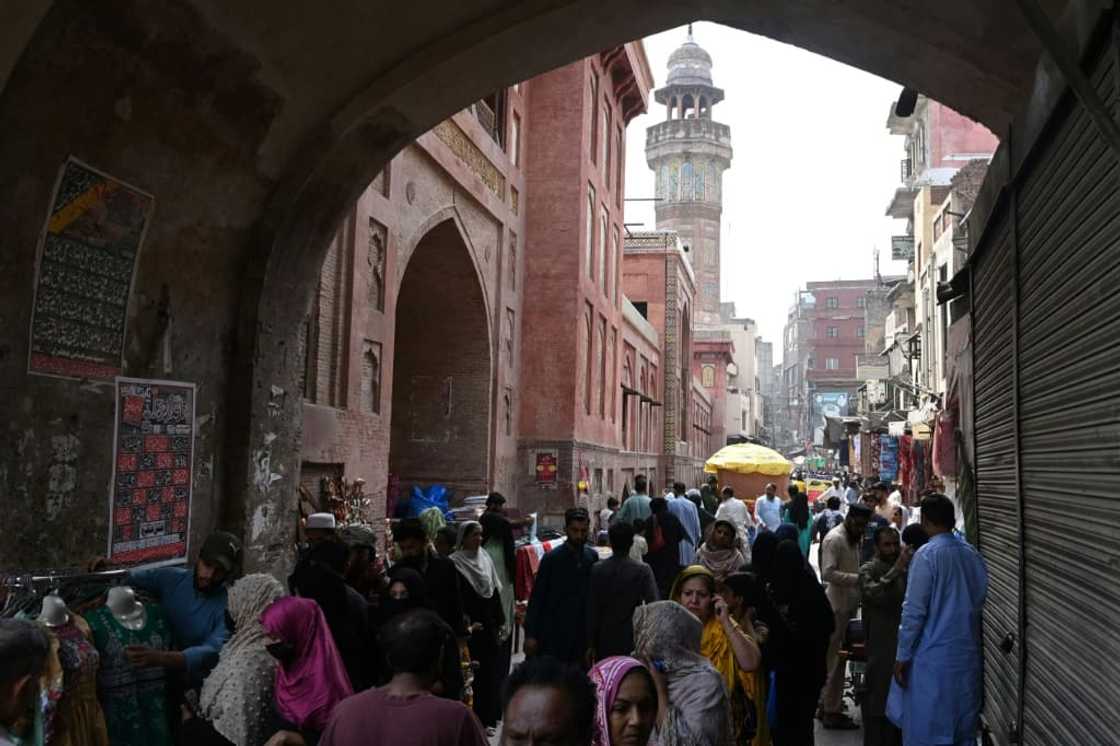 Instead of buying off-the-rack clothes for the girls, Fatima went shopping for fabric in the Old Lahore district and plans to home-stitch their holiday outfits Instead of buying off-the-rack clothes for the girls, Fatima went shopping for fabric in the Old Lahore district and plans to home-stitch their holiday outfits