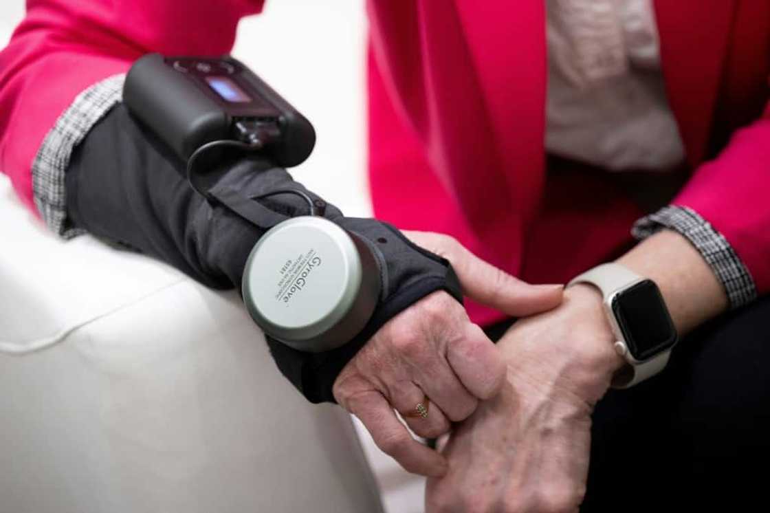 A GyroGlove that counters tremors caused by Parkinson's disease contains inner workings that spin faster than a jet turbine, and its creators at GyroGear are keen to reduce its size in future versions A GyroGlove that counters tremors caused by Parkinson's disease contains inner workings that spin faster than a jet turbine, and its creators at GyroGear are keen to reduce its size in future versions