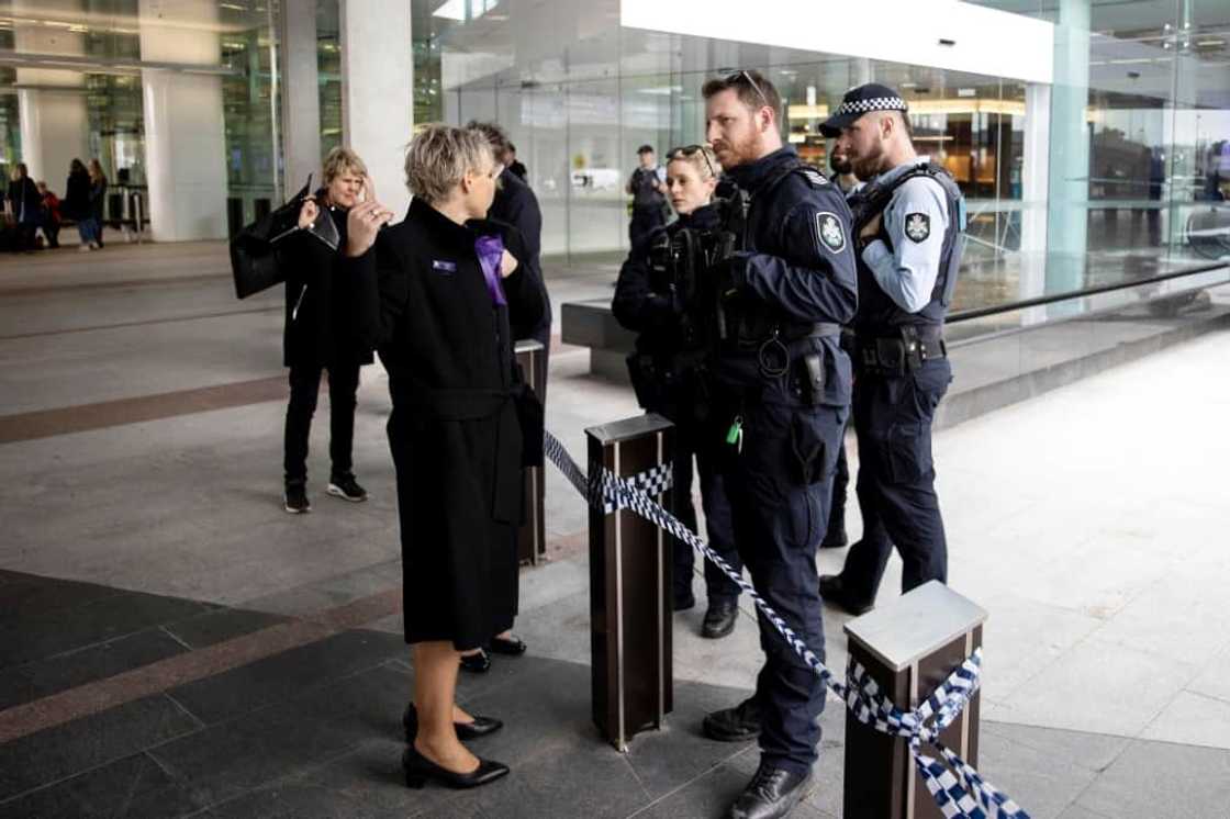 A gunman fired around five shots inside Canberra's main airport Sunday, sending passengers fleeing but injuring no one before he was detained by police A gunman fired around five shots inside Canberra's main airport Sunday, sending passengers fleeing but injuring no one before he was detained by police