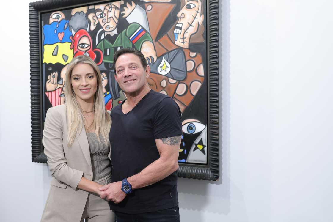 Cristina Invernizzi and Jordan Belfort at an exhibition