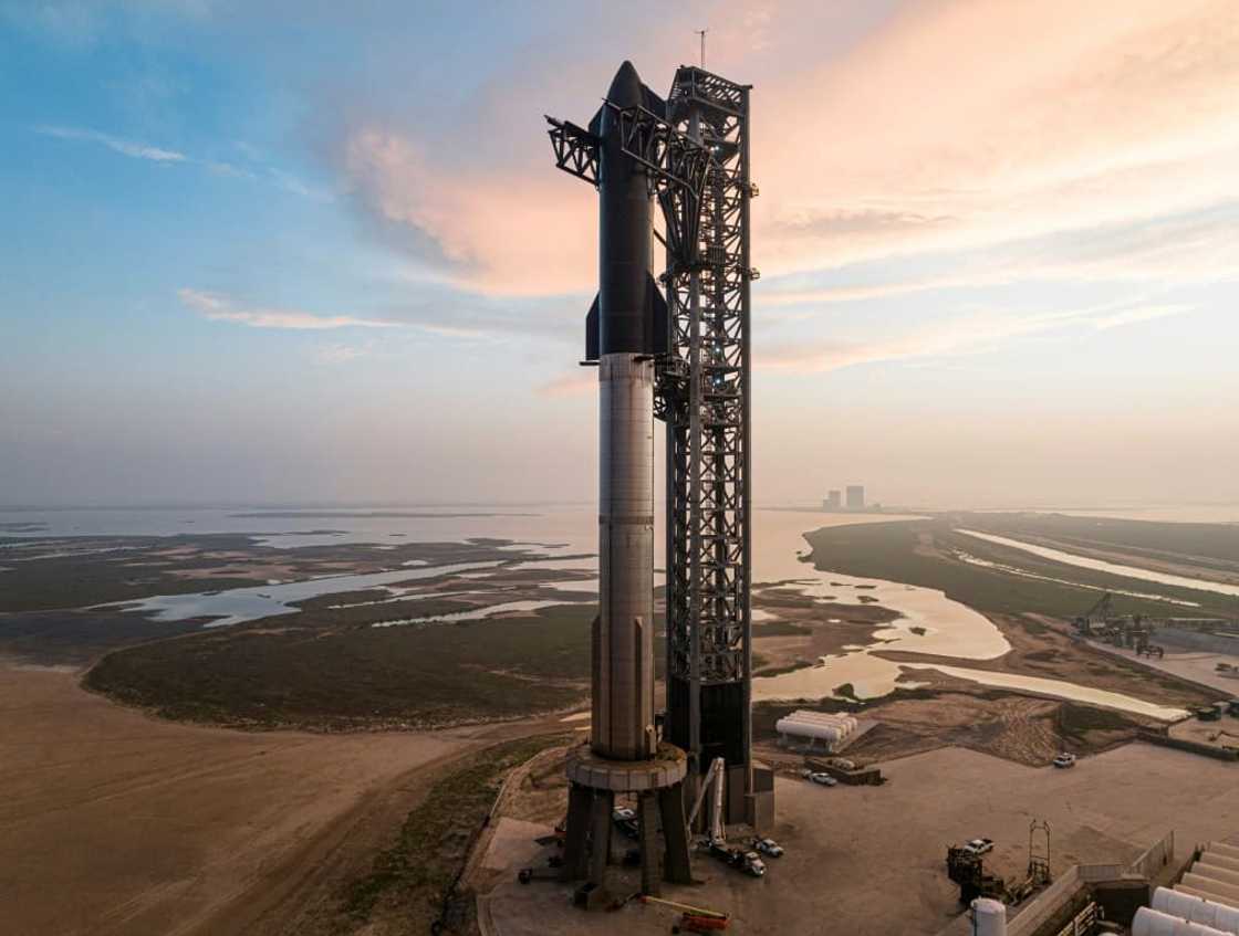 The US space agency NASA has picked the gaint Starship spacecraft, pictured on the Super Heavy booster rocket at the SpaceX Starbase in Boca Chica, Texas, to ferry astronauts to the Moon in late 2025