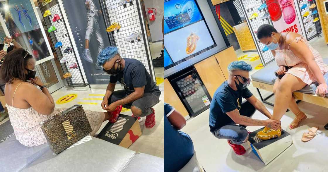 Somizi humbles himself to help customers try on his new shoes Somizi humbles himself to help customers try on his new shoes