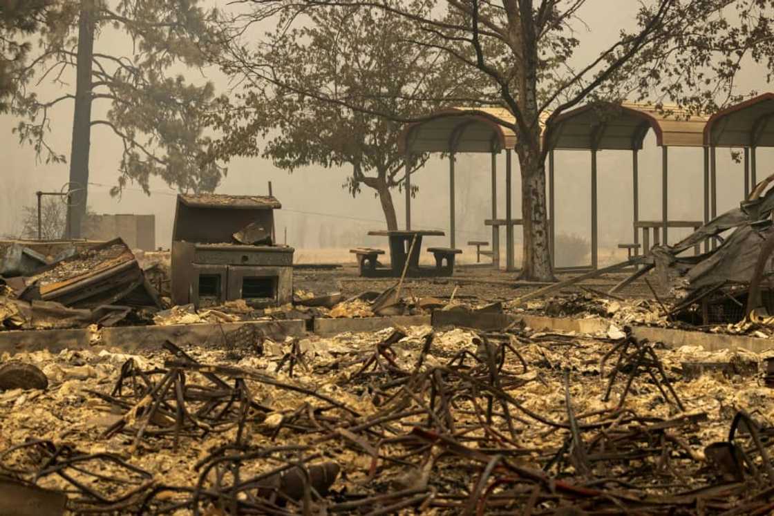 The century-old Klamath River Community Hall lies in ruins after it was destroyed by the McKinney Fire in the Klamath National Forest northwest of Yreka, California