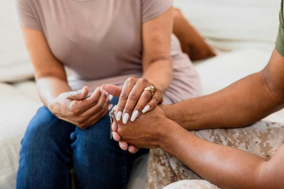 A man and woman hoding hands A man and woman hoding hands