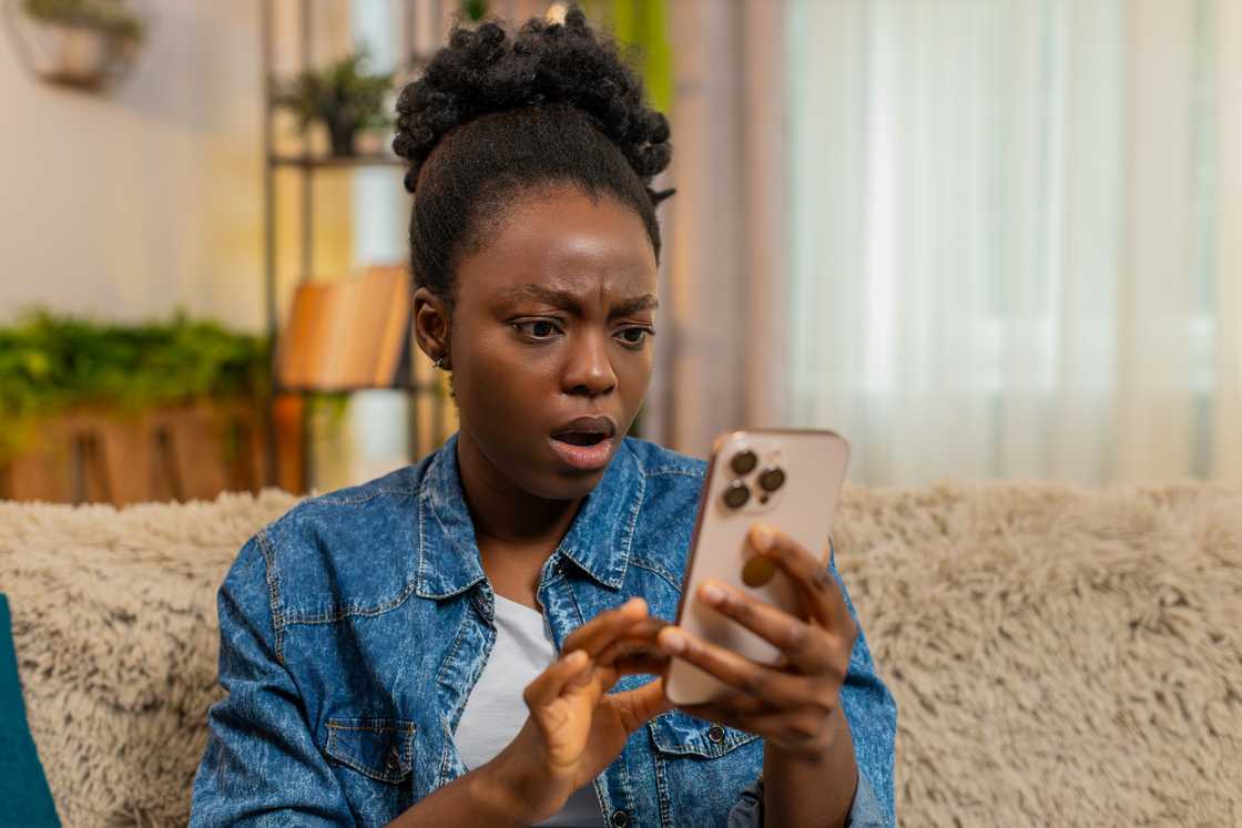 A lady reads a shocking text