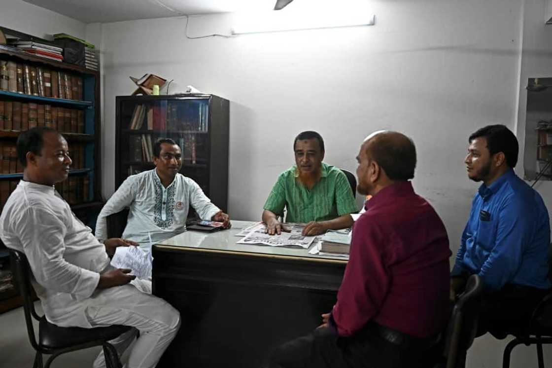 Critics of the status quo like Ayasur Rahman (C), say it's time to send the Rohingya back to Myanmar Critics of the status quo like Ayasur Rahman (C), say it's time to send the Rohingya back to Myanmar