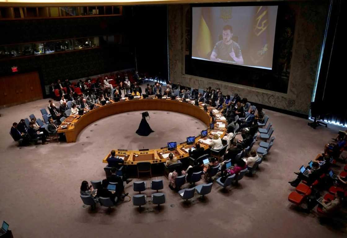 Ukrainian President Volodymyr Zelensky appears on screen as he addresses the UN Security Council meeting on Ukraine in New York on August 24, 2022 Ukrainian President Volodymyr Zelensky appears on screen as he addresses the UN Security Council meeting on Ukraine in New York on August 24, 2022