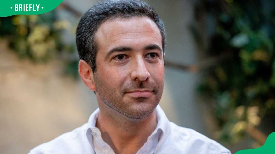 Attorney Ari Melber at a garden cocktail party in 2018