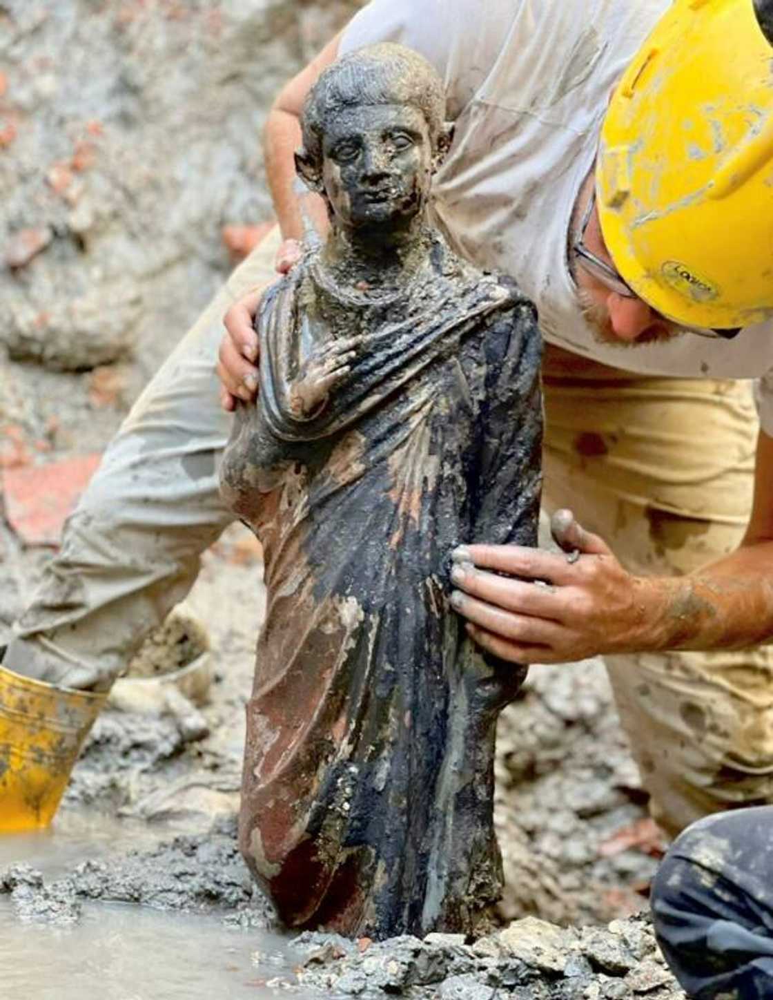 The bronzes are nearly perfectly preserved in the mud of hot water springs