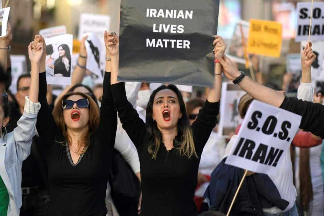 Protesters in support of Kurdish woman Mahsa Amini rally in Madrid on Saturday, part of a global wave of solidarity demonstrations