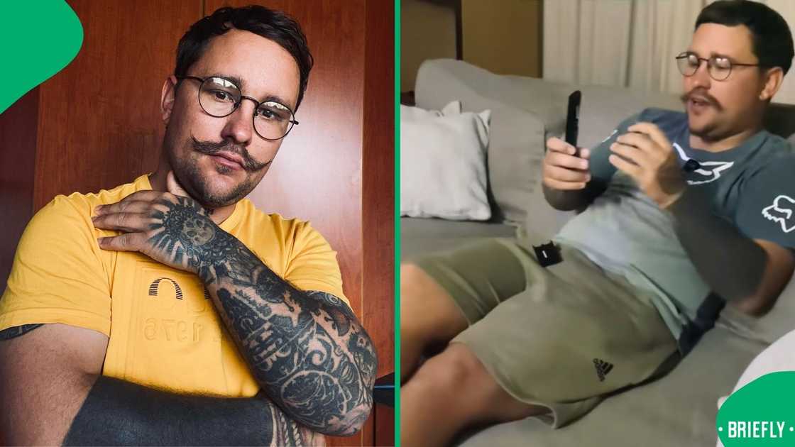 The man tapped the remote on his lap and head, and when it did not work, he took out the battery and bit it The man tapped the remote on his lap and head, and when it did not work, he took out the battery and bit it