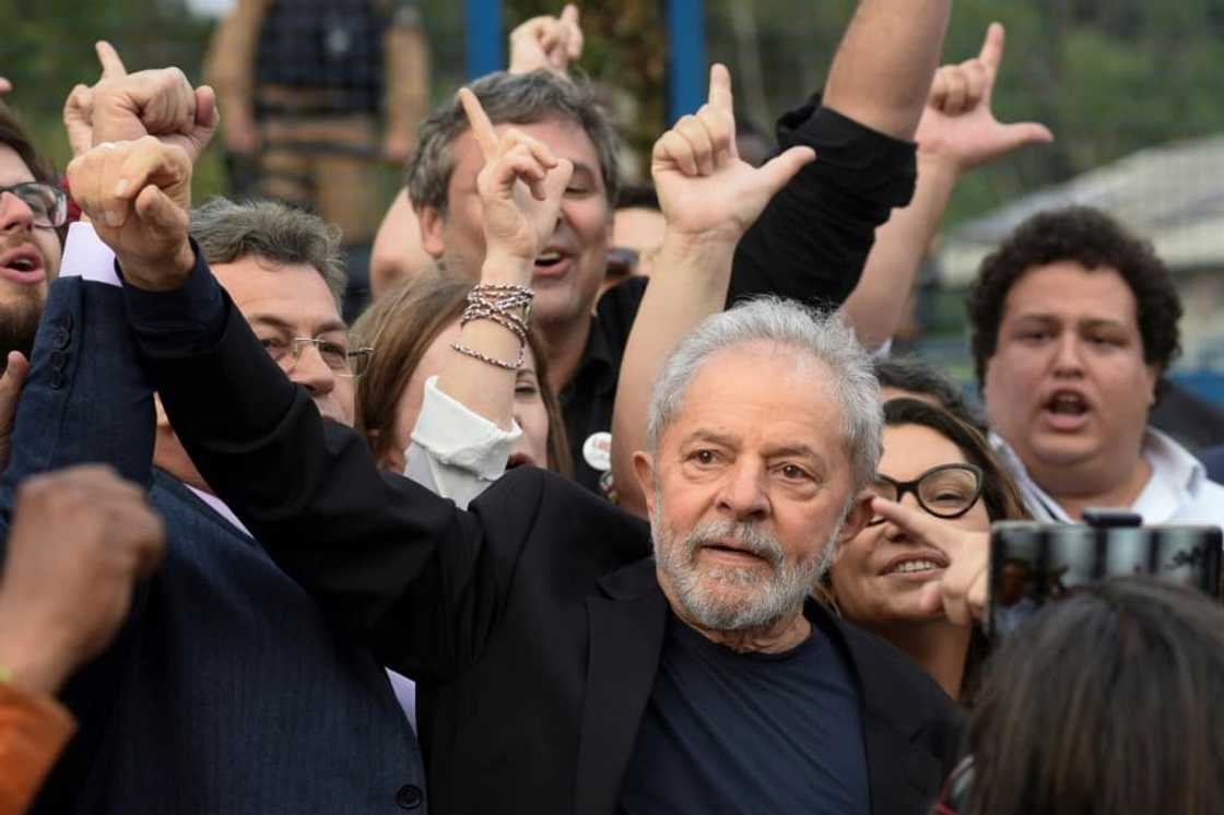 Former Brazilian President Luiz Inacio Lula da Silva gestures as he leaves the Federal Police headquarters where he was serving a sentence for corruption and money laundering, in Curitiba, Parana State, Brazil in November 2019